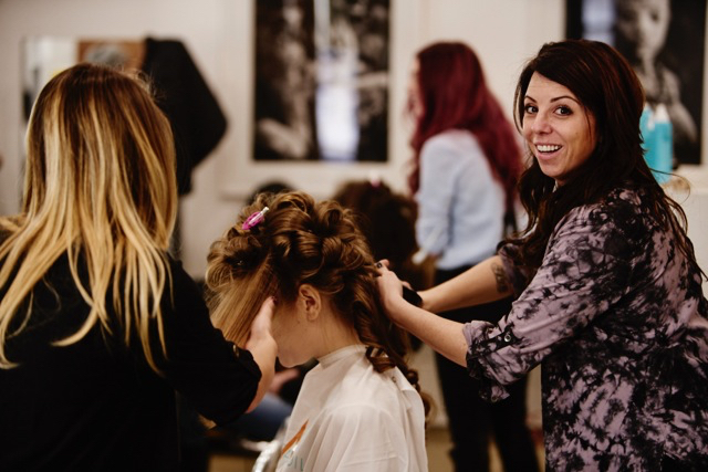 Stylists unrolling curls